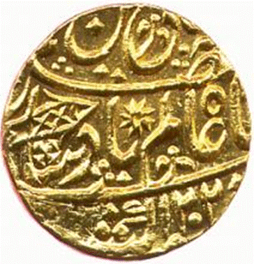 A gold coin with arabic writing

Description automatically generated with low confidence