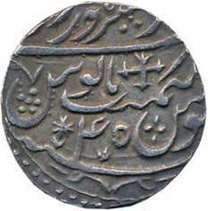 A close-up of a coin

Description automatically generated