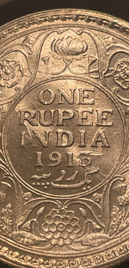 A close-up of a coin

Description automatically generated