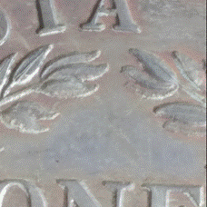 A picture containing art, artifact, carving, relief

Description automatically generated