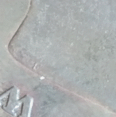 A close up of a stone surface
Description automatically generated with low confidence