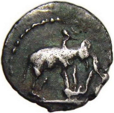 A close-up of a coin

Description automatically generated