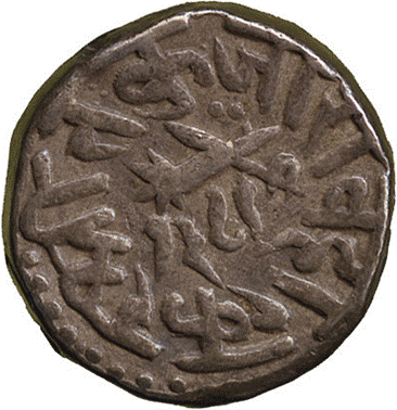 A close-up of a coin

Description automatically generated