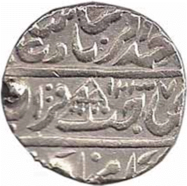 A close-up of a coin

Description automatically generated with medium confidence