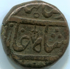 A close-up of a coin

Description automatically generated with medium confidence