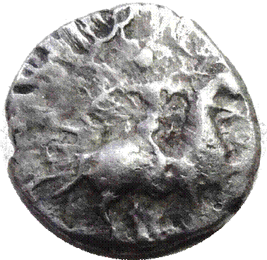 A close up of a coin

Description automatically generated with medium confidence